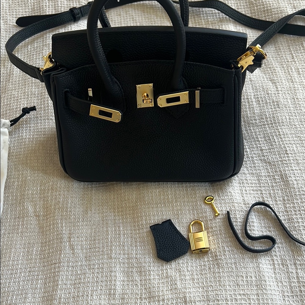 Chic Black Crossbody Bag with Gold Accents